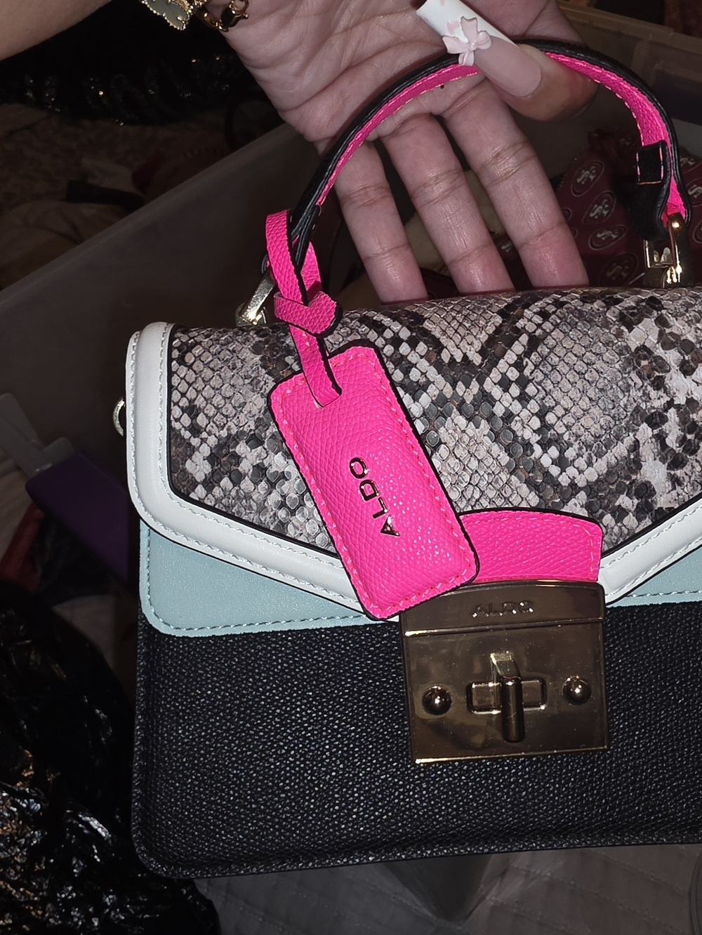 Aldo Black Textured Satchel with Snake-Print Flap & Neon Pink Accents